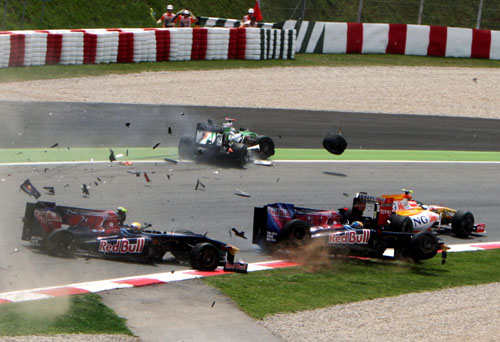 Toro Rosso's Sebastien Buemi and Sebastien Bordais collide