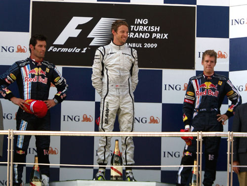 Jenson Button holds off a Red Bull challenge to win in Turkey