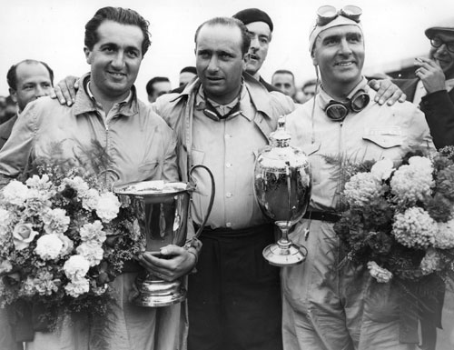 Alberto Ascari, Juan Manuel Fangio and Nino Farina after the British Grand Prix,