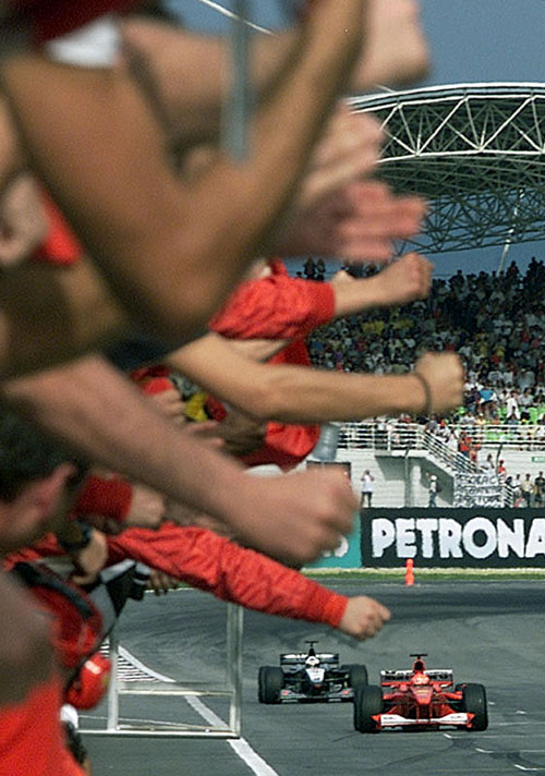 Michael Schumacher approaches the finish line