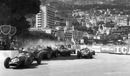 Cars battle for space on the track at a closely fought corner in the early stages of the Monaco Grand Prix