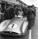 Juan Manuel Fangio getting out of his Mercedes