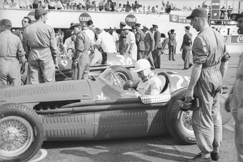 Stirling Moss in a Maserati at the start of the race