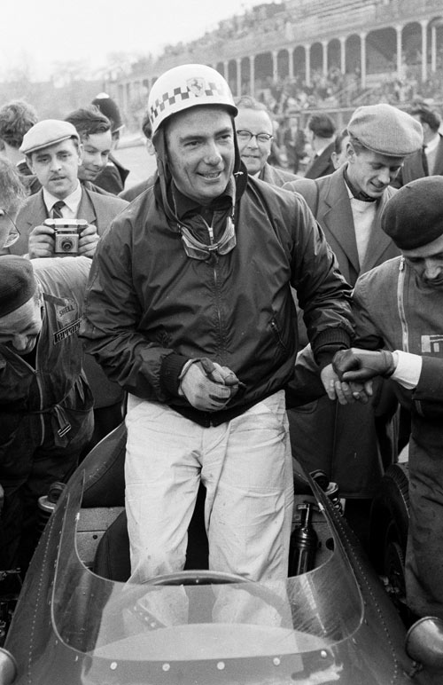 A delighted Jean Behra after winning the non-Championship BARC 200 race