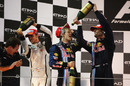 Christian Horner, Jenson Button, Sebastian Vettel and Mark Webber  celebrate on the podium