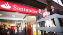 Lewis Hamilton helps chairman Emilio Botin open a newly-rebranded bank