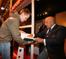 ESPNF1 columnist Sir Stirling Moss meets a young fan