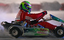 Felipe Massa drives a go kart on a frozen lake in Italy