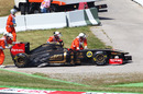 The charred remains of Nick Heidfeld's Renault after it caught fire in final practice
