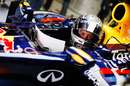 Sebastian Vettel studies data during qualifying 