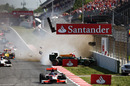 Fabio Leimer leads into the first corner as Jules Bianchi smashes against the barrier