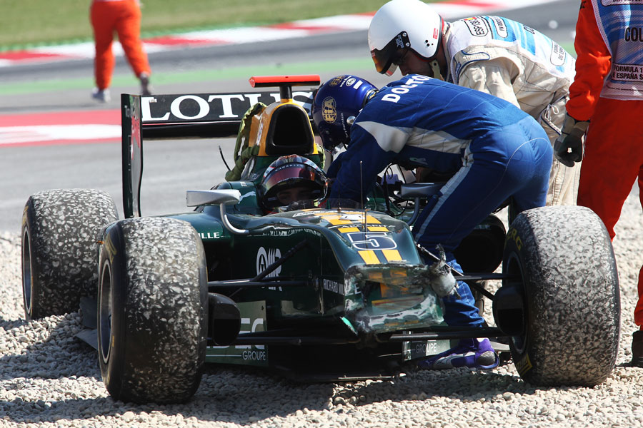 A medical crew tends to Jules Bianchi after a huge crash at the start of the race