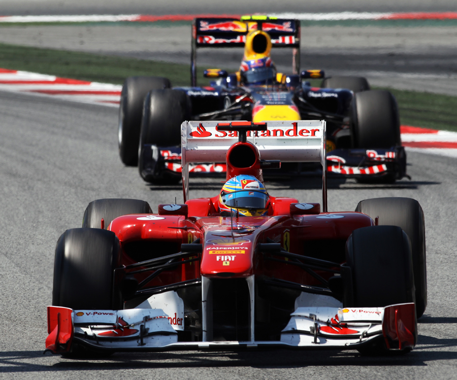 Mark Webber struggles to find a way past Fernando Alonso