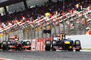 Lewis Hamilton attacks Sebastian Vettel on the pit straight