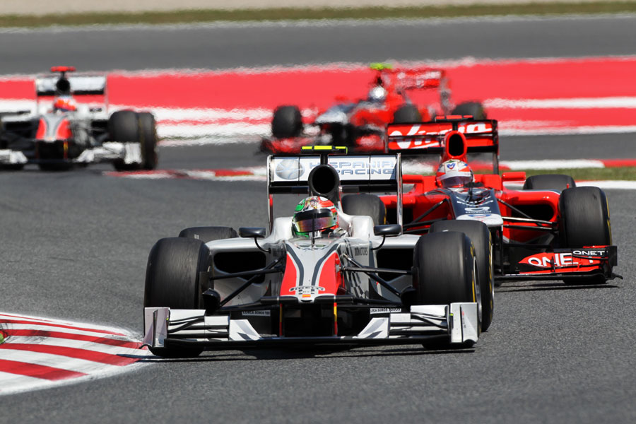 Tonio Liuzzi leads the battle of the backmarkers