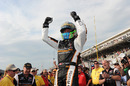 Alex Tagliani celebrates pole position after qualifying at the Indianapolis 500