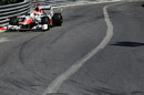 Narain Karthikeyan takes a wide entrance into the Loews Hairpin on one of his 37 laps in FP1