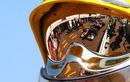 Daniel Ricciardo is reflected in a marshals visor