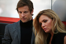 Jenson Button does the dirty part of the job: working with a model for a McLaren sponsor