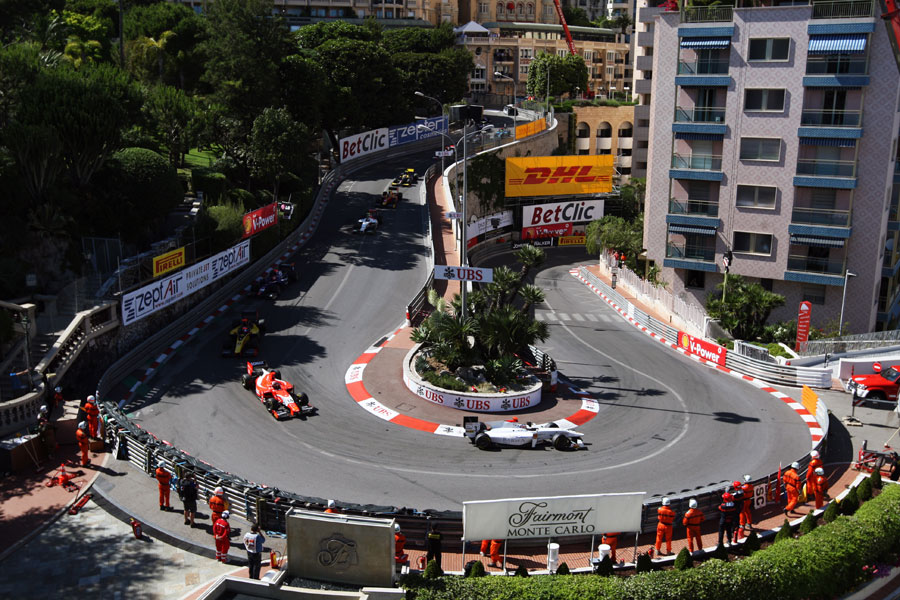 Charles Pic leads the field round the Loews hairpin
