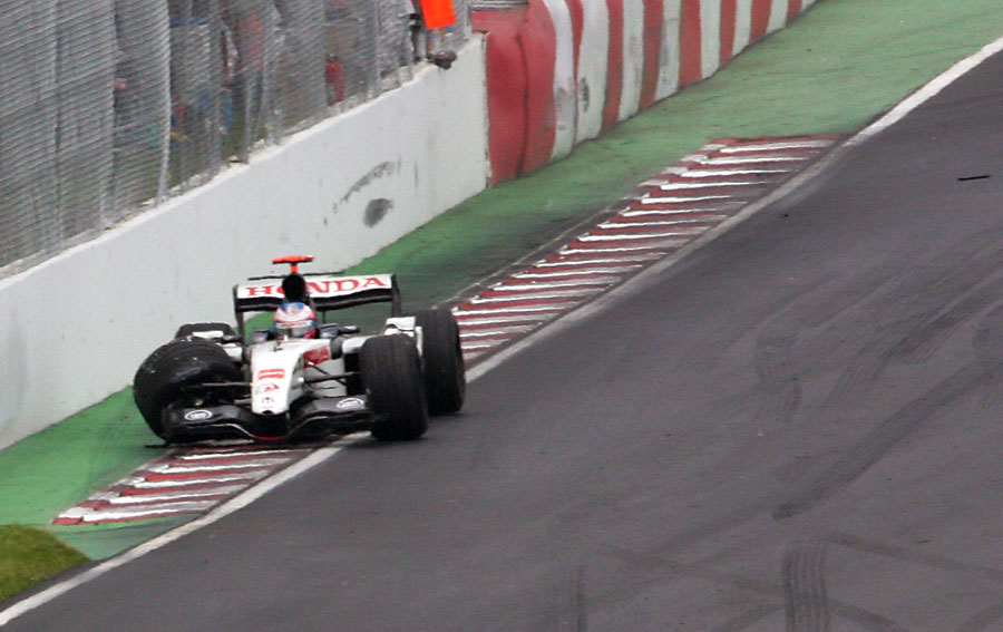 Jenson Button ends his race in the wall of champions