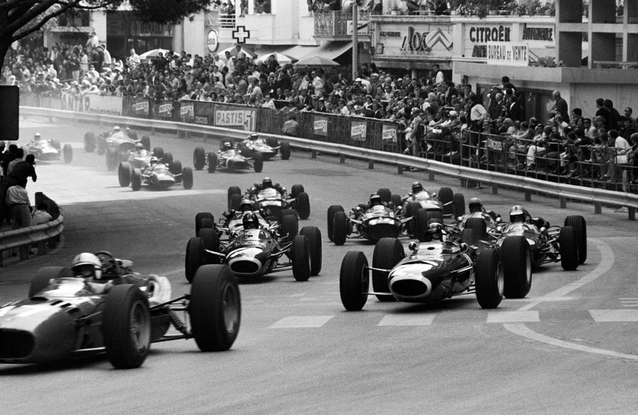John Surtees leads Jackie Stewart and the rest of the field in to Ste Devote