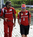 Fernando Alonso arrives at the circuit on Thursday
