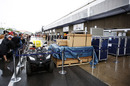 Heavy rain disrupts the teams trying to set up garages ahead of the race weekend