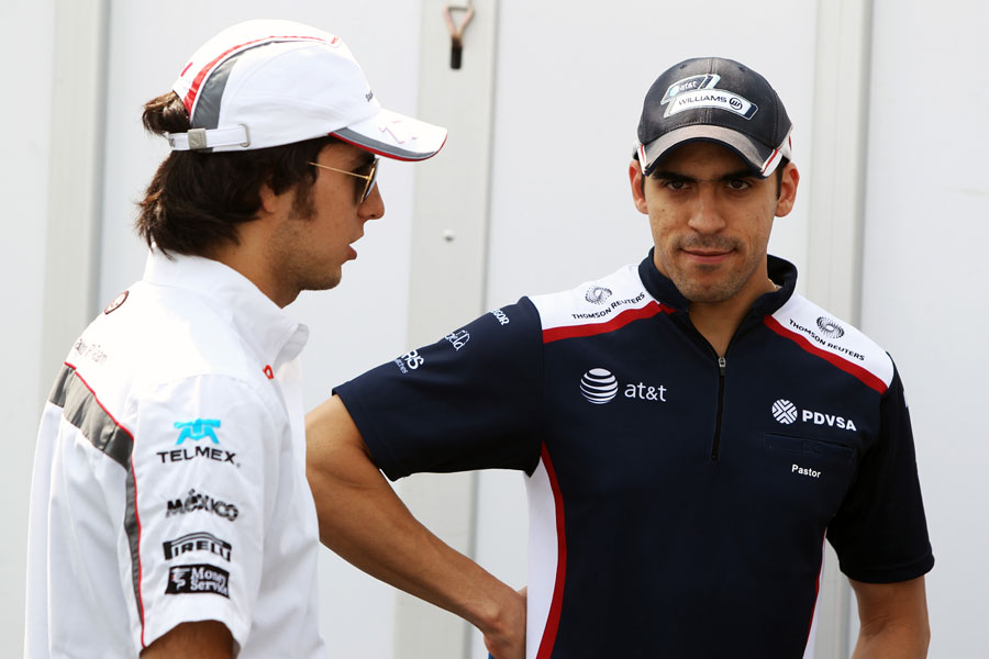 Sergio Perez and Pastor Maldonado chat before the press conference on Thursday