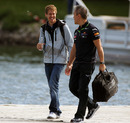 Sebastian Vettel arrives in the paddock on Friday morning