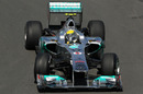 Nico Rosberg struggles for grip on the slippery track