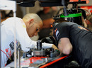 Lewis Hamilton gets hands-on with the McLaren