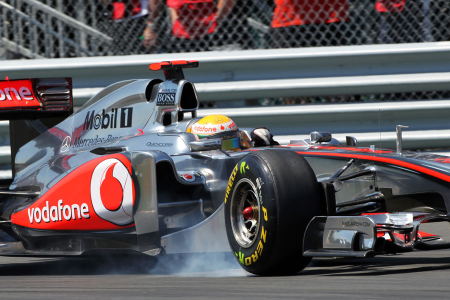 Lewis Hamilton locks a wheel under braking