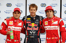 Sebastian Vettel celebrates his pole position with Fernando Alonso and Felipe Massa