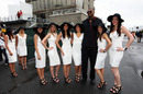 Grid girls pose with NBA basketballer Andrew Bynum