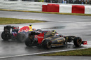 Vitaly Petrov and Mark Webber battle for position