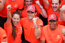 Jenson Button celebrates his remarkable victory with girlfriend Jessica Michibata and Lewis Hamilton
