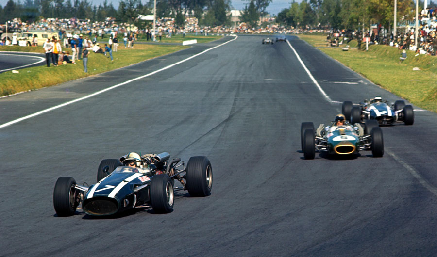 John Surtees leads Jack Brabham and Denny Hulme