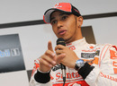 Lewis Hamilton takes questions at a press conference