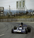 Jackie Stewart slides his Tyrrell towards victory