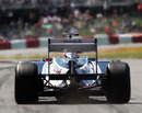 Rubens Barrichello leaves the pits