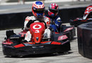 Jenson Button leads Maximo Cortes in a karting event for sponsors Vodafone