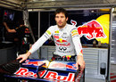 Mark Webber pauses for thought in the Red Bull garage