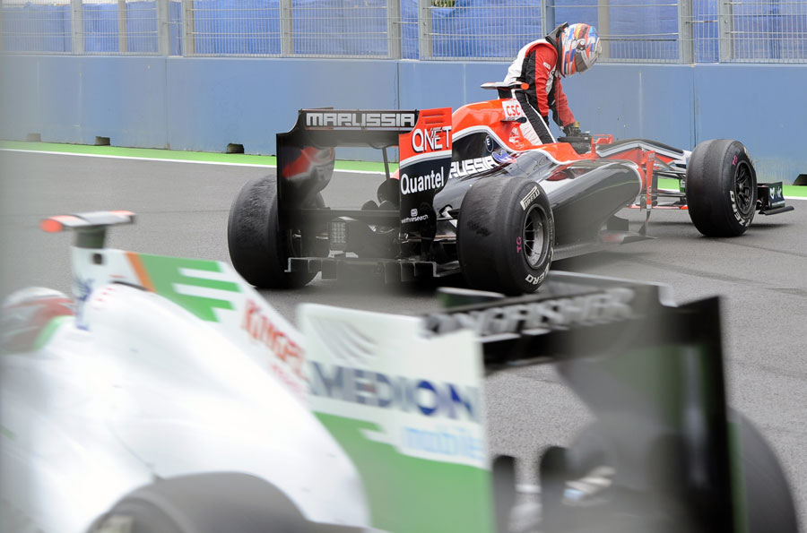 Timo Glock climbs out of his Virgin after a spin 