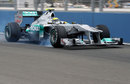 Nico Rosberg locks a wheel in his Mercedes