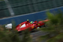 Felipe Massa blasts between the walls
