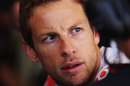 Jenson Button talks to his engineers