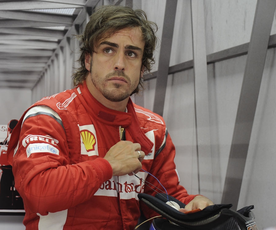 Fernando Alonso at the back of the Ferrari garage 