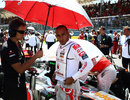 Lewis Hamilton collects his thoughts ahead of the start of the race