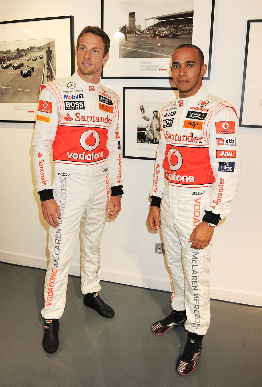 Lewis Hamilton and Jenson Button attend the launch of the 'Driven To Do Better' British Grand Prix exhibition